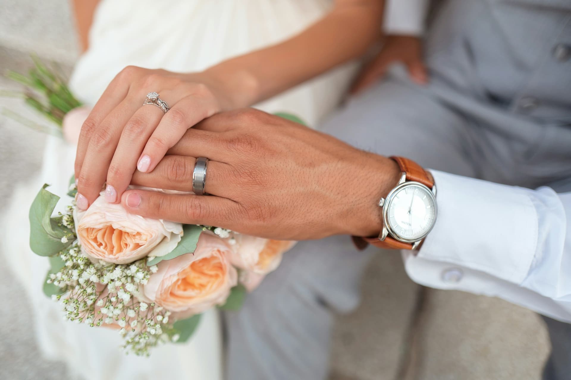 Venue details with greenery and floral decor
